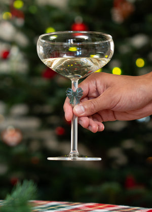 Elegant 320 ml wine glass with an embossed bow design from Flying Tiger Copenhagen, perfect for stylish kitchen use.