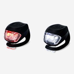 Two Flying Tiger Copenhagen leisure bicycle lights, front and rear, mounted on a bicycle for visibility and safety.