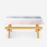 Flying Tiger Copenhagen leisure picnic cover shown on a table, featuring a colorful, durable outdoor fabric for picnics and outdoor activities.