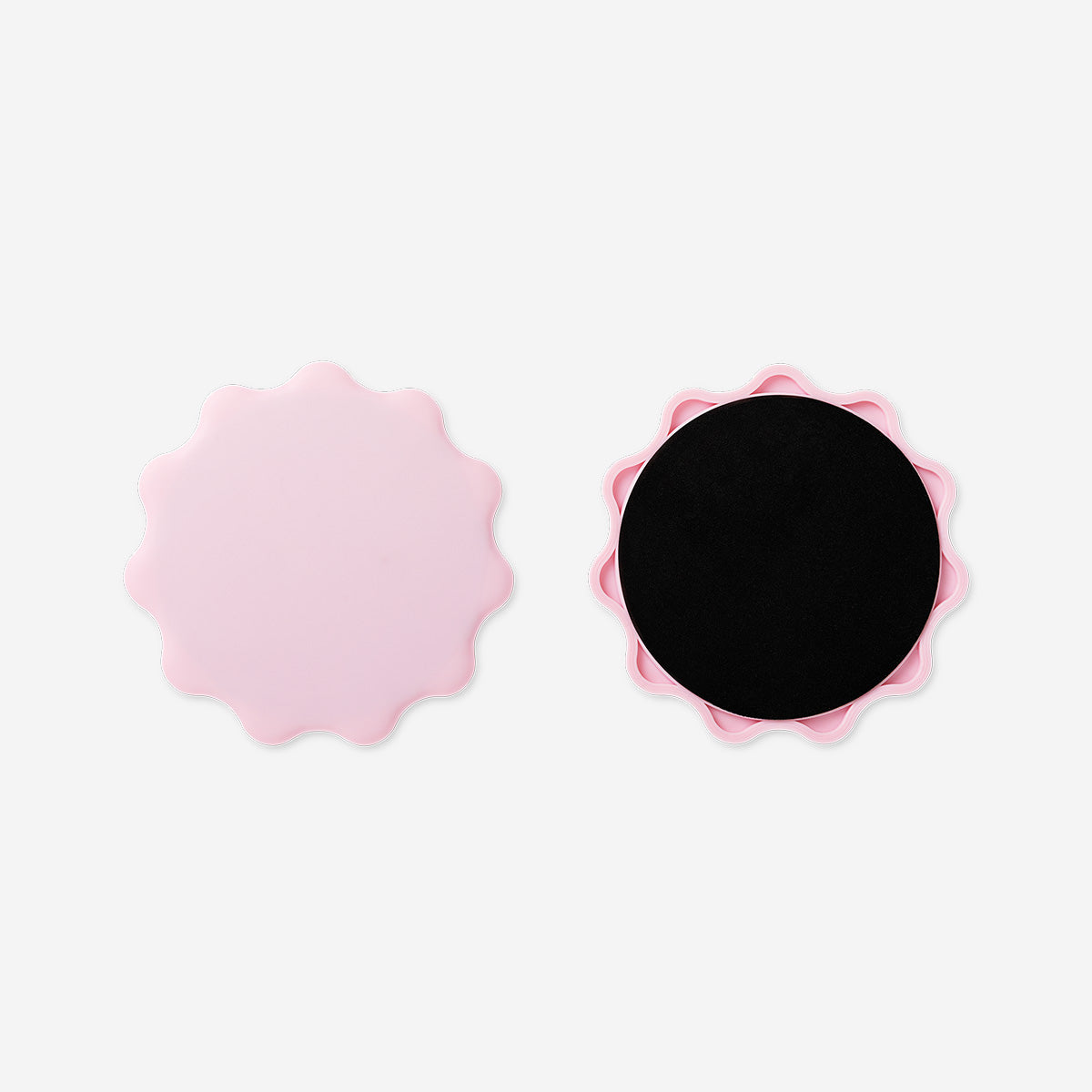 Pink core slider discs for leisure, set of 2, by Flying Tiger Copenhagen, shown on a smooth surface for indoor exercise and fun.