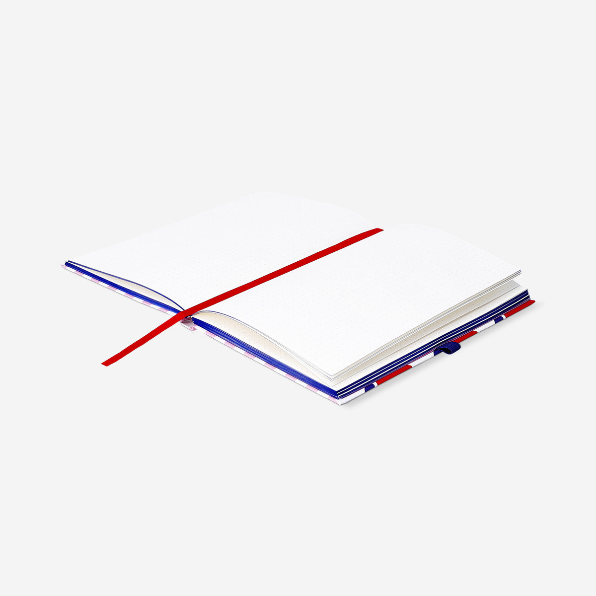 A5 Bullet planner with apple design from Flying Tiger Copenhagen, featuring a vibrant cover and organized interior pages.
