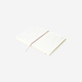 A5 linen daily diary 2026 by Flying Tiger Copenhagen, open to show weekly planner pages with date headers.
