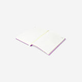 A5 purple daily diary 2026 by Flying Tiger Copenhagen, open to show pages, with a soft purple cover and office use design.