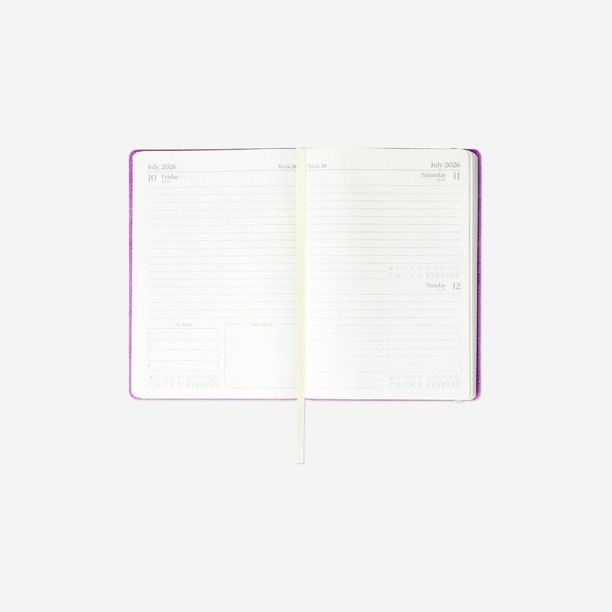 A5 purple daily diary 2026 by Flying Tiger Copenhagen, open to show date pages, office planner with colorful accents.