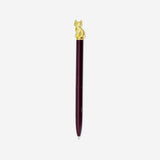 Black ink ballpoint pen with gold cat topper from Flying Tiger Copenhagen for office use.