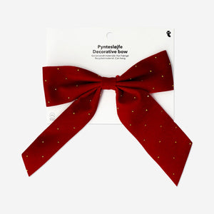 Big red velvet bow, 19 cm, from Flying Tiger Copenhagen, suitable for office decor or gift wrapping.