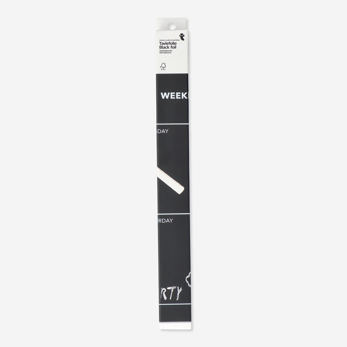 Black self-adhesive foil for office use, from Flying Tiger Copenhagen, shown applied to a surface in a modern workspace.