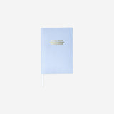Blue notebook with statement Office Flying Tiger Copenhagen 