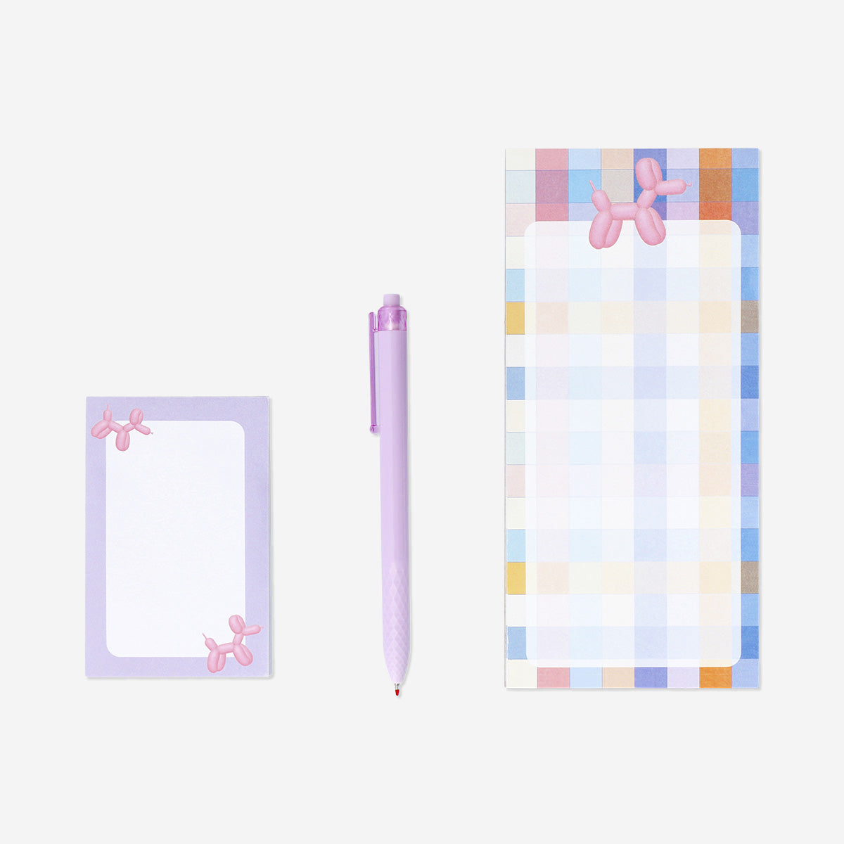 Checkered notepad with pen and memos