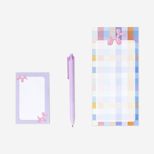 Checkered notepad with pen and memos