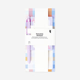 Checkered notepad with pen and memos