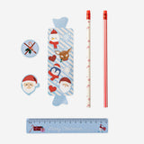 Christmas-themed stationery kit by Flying Tiger Copenhagen featuring festive notebooks, pens, and holiday-themed office supplies.