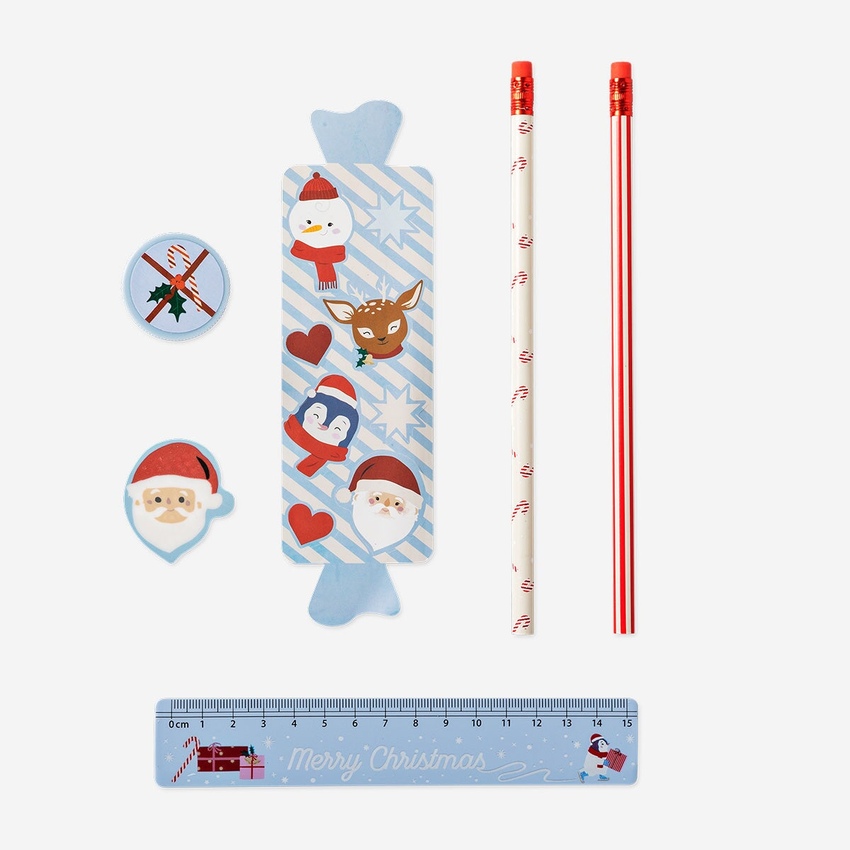 Christmas-themed stationery kit by Flying Tiger Copenhagen featuring festive notebooks, pens, and holiday-themed office supplies.