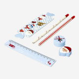 Christmas-themed stationery kit from Flying Tiger Copenhagen featuring festive office supplies like pens, notepads, and decorations.