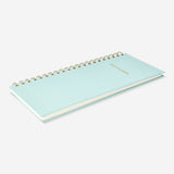 Flying Tiger Copenhagen office daily planner pad with numbered pages and weekly layout for organized daily scheduling.