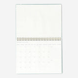 Desk calendar by Flying Tiger Copenhagen featuring a clean, minimalist design for office organization and scheduling.