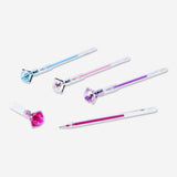 Set of four Flying Tiger Copenhagen gel ink pens with diamond accents, ideal for office and writing tasks.
