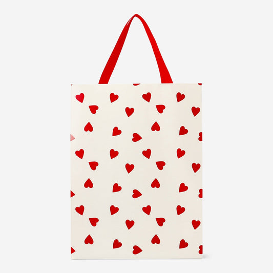 Gift bag with red hearts and handle