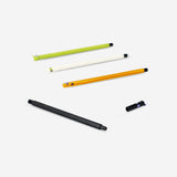 Set of four glow-in-the-dark erasable pens with little monster designs from Flying Tiger Copenhagen for office or creative use.