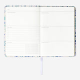 Flying Tiger Copenhagen gratitude journal for office use, featuring a clean cover design and lined pages for daily reflections.