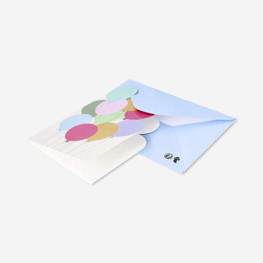 Greetings card with cut out balloons