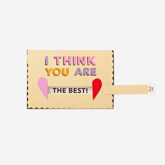 Greetings card with pull mechanism