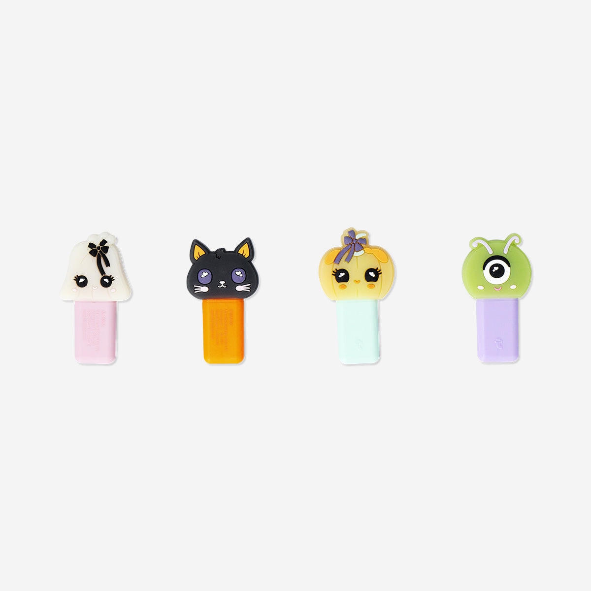 Four Flying Tiger Copenhagen highlighters with colorful little monster designs, ideal for office use.