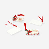Set of four Letters to Santa gift tags from Flying Tiger Copenhagen, featuring festive office-themed designs.