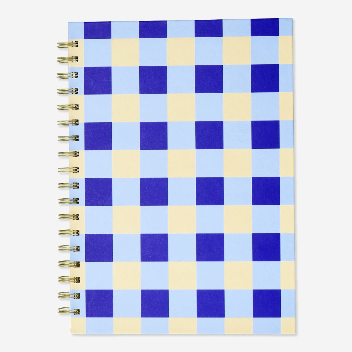 Office notebook from Flying Tiger Copenhagen with a ballpoint pen and sticky memos on a desk.