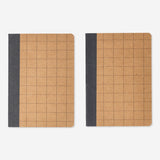 Set of two Flying Tiger Copenhagen office notebooks with plain covers, ideal for note-taking and organization.
