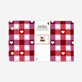 Photo album with red hearts
