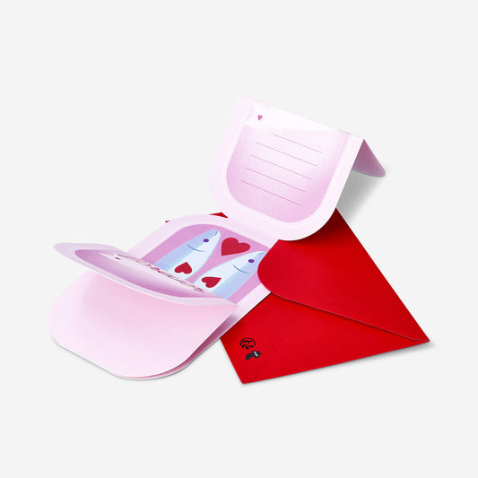 Tarjeta de felicitación rosa con sardinas