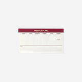 Red Flying Tiger Copenhagen weekly planner for desk, featuring a compact office organizer with daily and weekly scheduling pages.