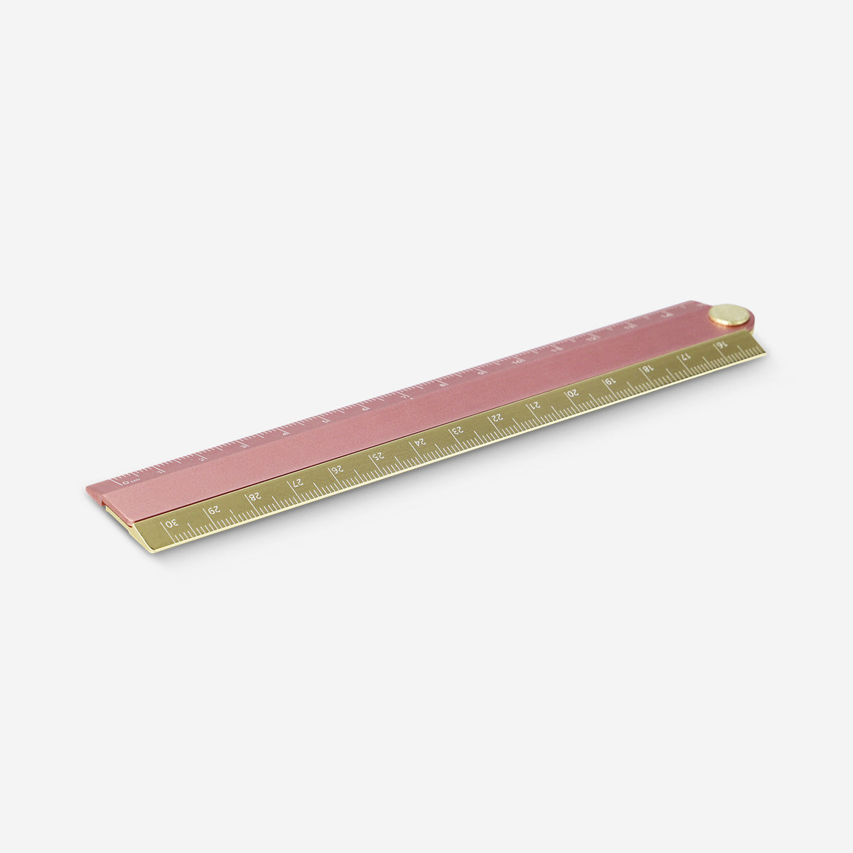 Pink foldable metal ruler from Flying Tiger Copenhagen, ideal for office or craft use, featuring clear measurement markings.