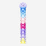 Office ruler by Flying Tiger Copenhagen with push mechanism, featuring clear measurement markings on a white background.