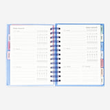 Flying Tiger Copenhagen study planner in Spanish for office use, featuring a colorful cover and organized layout.