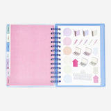 Flying Tiger Copenhagen study planner in Spanish for office use, featuring organized pages and a colorful cover design.