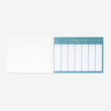 Weekly planner with tear-off pages from Flying Tiger Copenhagen, featuring a clean office design for organized planning.