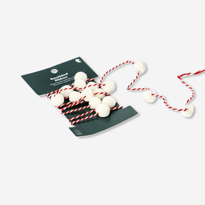 White pom pom ribbon from Flying Tiger Copenhagen, 2 meters long, ideal for office decor and craft projects.