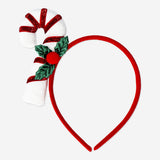 Candycane hairband for adults by Flying Tiger Copenhagen, festive party accessory with red and white candy cane design.
