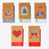 Set of 15 Flying Tiger Copenhagen Christmas cards with matching envelopes, perfect for holiday parties and festive greetings.