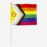 Colorful rainbow flag on a stick, 45 cm, perfect for parties, by Flying Tiger Copenhagen, displayed outdoors with vibrant colors.