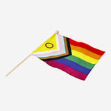 Colorful rainbow flag on a stick, 45 cm, for parties, by Flying Tiger Copenhagen, with vibrant rainbow stripes.