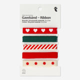 Set of three colorful cotton ribbons for party decoration, by Flying Tiger Copenhagen, shown in vibrant, neatly bundled arrangements.