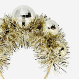 Adult disco ball hairband for parties, featuring shiny, reflective disco ball design by Flying Tiger Copenhagen.