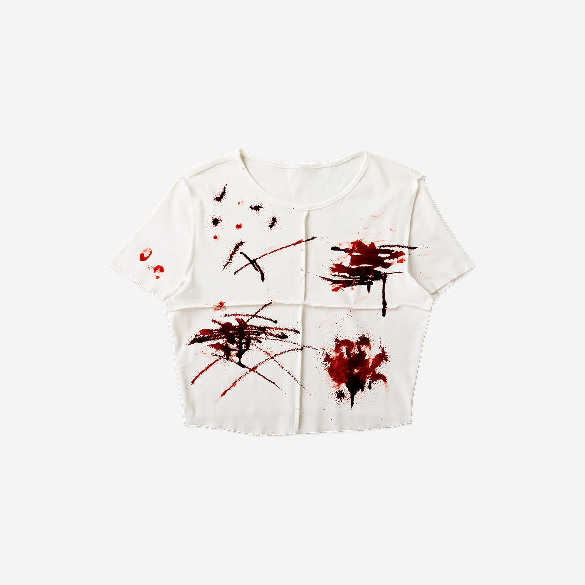 Fake blood for textiles in party supplies by Flying Tiger Copenhagen, shown spilled on fabric for spooky effect.