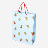 Party gift bag from Flying Tiger Copenhagen featuring festive gingerbread people for holiday celebrations.