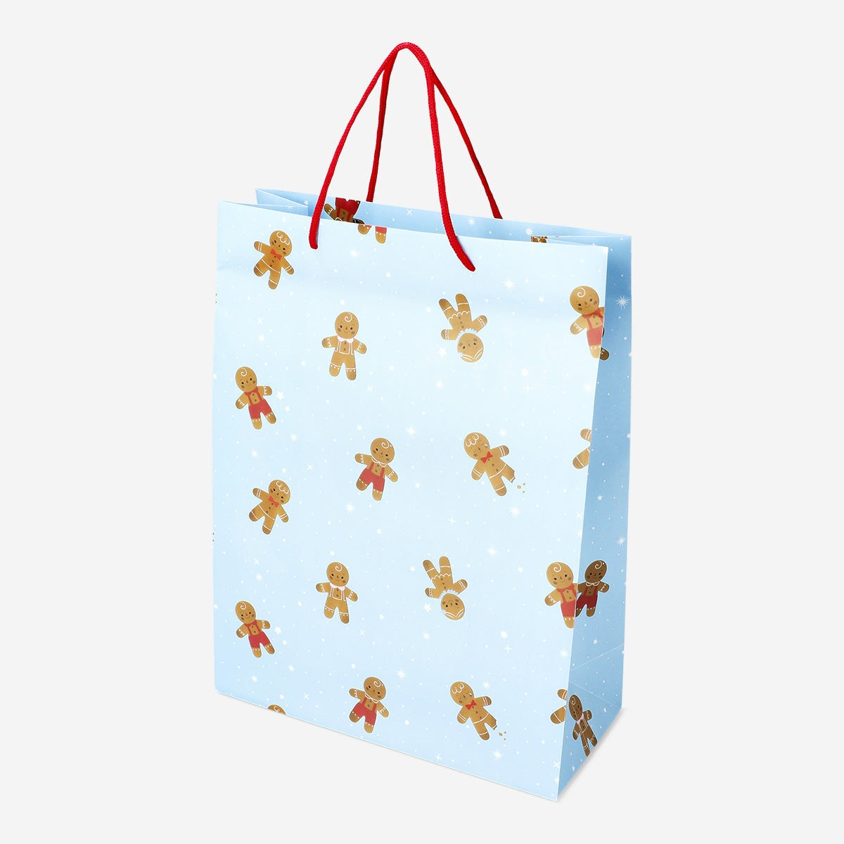 Party gift bag from Flying Tiger Copenhagen featuring festive gingerbread people for holiday celebrations.