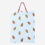 Party gift bag from Flying Tiger Copenhagen featuring colorful gingerbread people design for festive occasions.