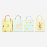 Four colorful Flying Tiger Copenhagen party gift bags with festive designs, perfect for gift wrapping and celebrations.